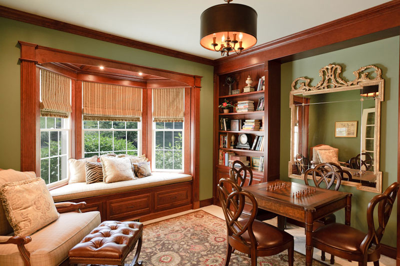 Home library with built-in window seat made with fine woodworking.
